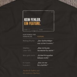 Druck-Nahaufnahme: Fotografen-T-Shirt «Kein Fehler. Ein Feature.» von hemmi.photo – Rückendruck